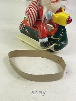 Vintage Santa Claus on Scooter Tin Litho Battery Operated Christmas Toy With Box