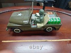 Vintage TN tin Army Jeep Battery Operated Mystery Action Made In Japan Tin