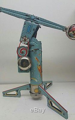 Vintage TWIRLY WHIRLY ROCKET RIDE Battery Op. Tin Lithograph Toy Twirley Whirley