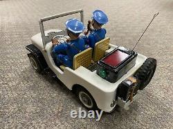 + Vintage T. N. Japan Tin Battery Operated Police Jeep