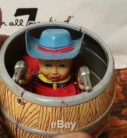 Vintage Tin Battery Operated Cowboy in a Barrel, by Swallow Toys of Japan