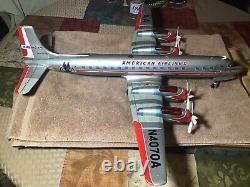 Vintage Tin Yonezawa Battery Operated American Airlines DC7 With Lighted Engines