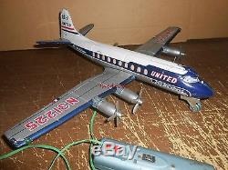 Vintage United airlines DC 7 Battery Operated Tin Toy Jet Airplane Japan