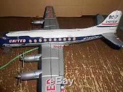 Vintage United airlines DC 7 Battery Operated Tin Toy Jet Airplane Japan