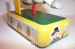 Vintage Yonezawa Galloping Cowboy Savings Bank battery operated Cragstan tin toy