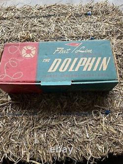 Vintage fleet line the dolphin toy boat