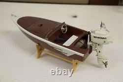Vintage toy outboard boat