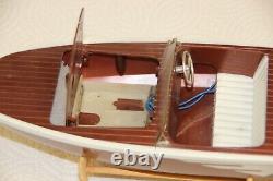 Vintage toy outboard boat